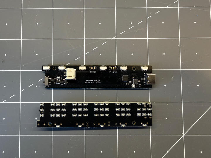 Front and back of the assembled PCB showing component placement and routing.